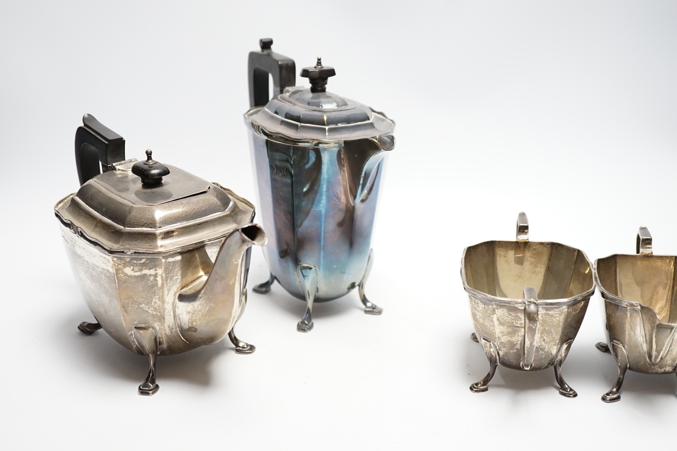 A George V silver three piece silver tea set, George Wish, Sheffield, 1929, 37.6oz, together with a silver plated hot water pot.